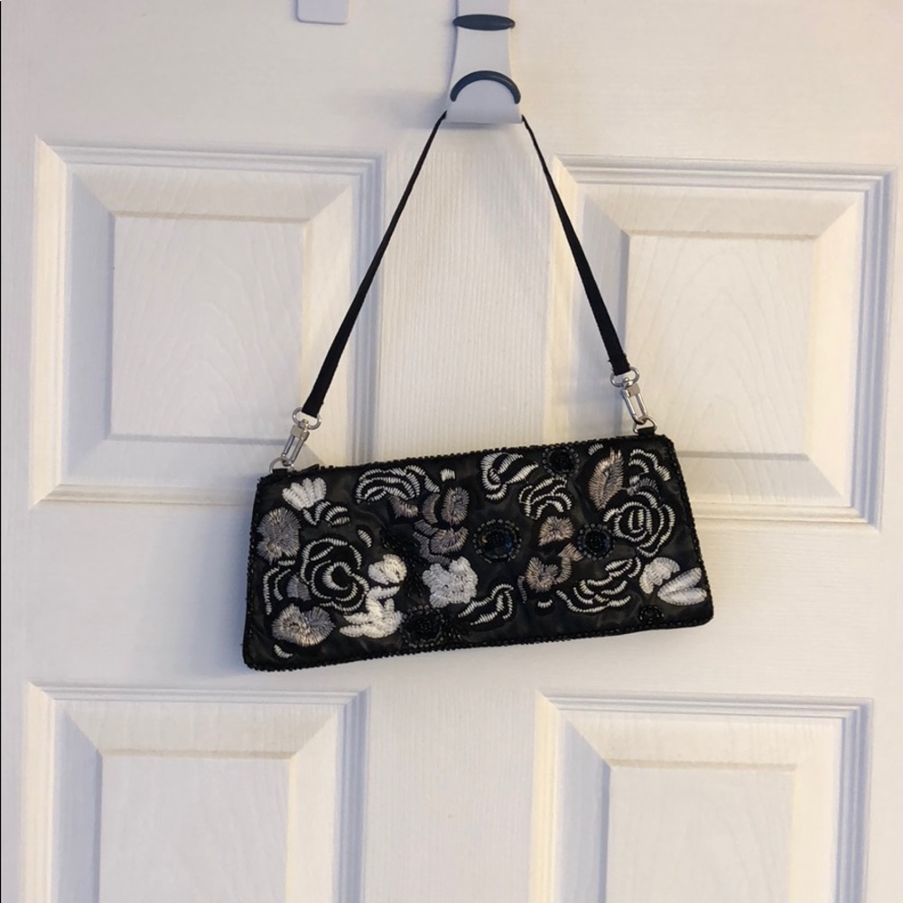 New York & Company black beaded clutch.
